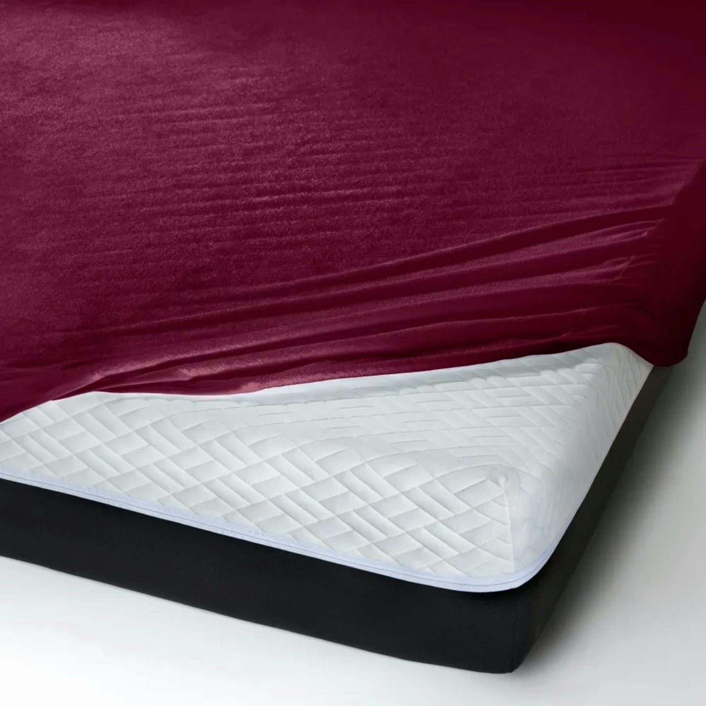 Uchuu's waterproof mattress cover in maroon color.